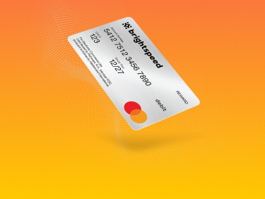 The silver Brightspeed Prepaid Mastercard on an orange background.