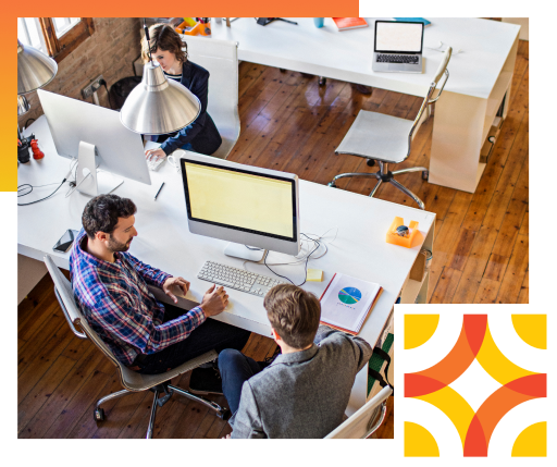 Business people collaborating in an open office setting