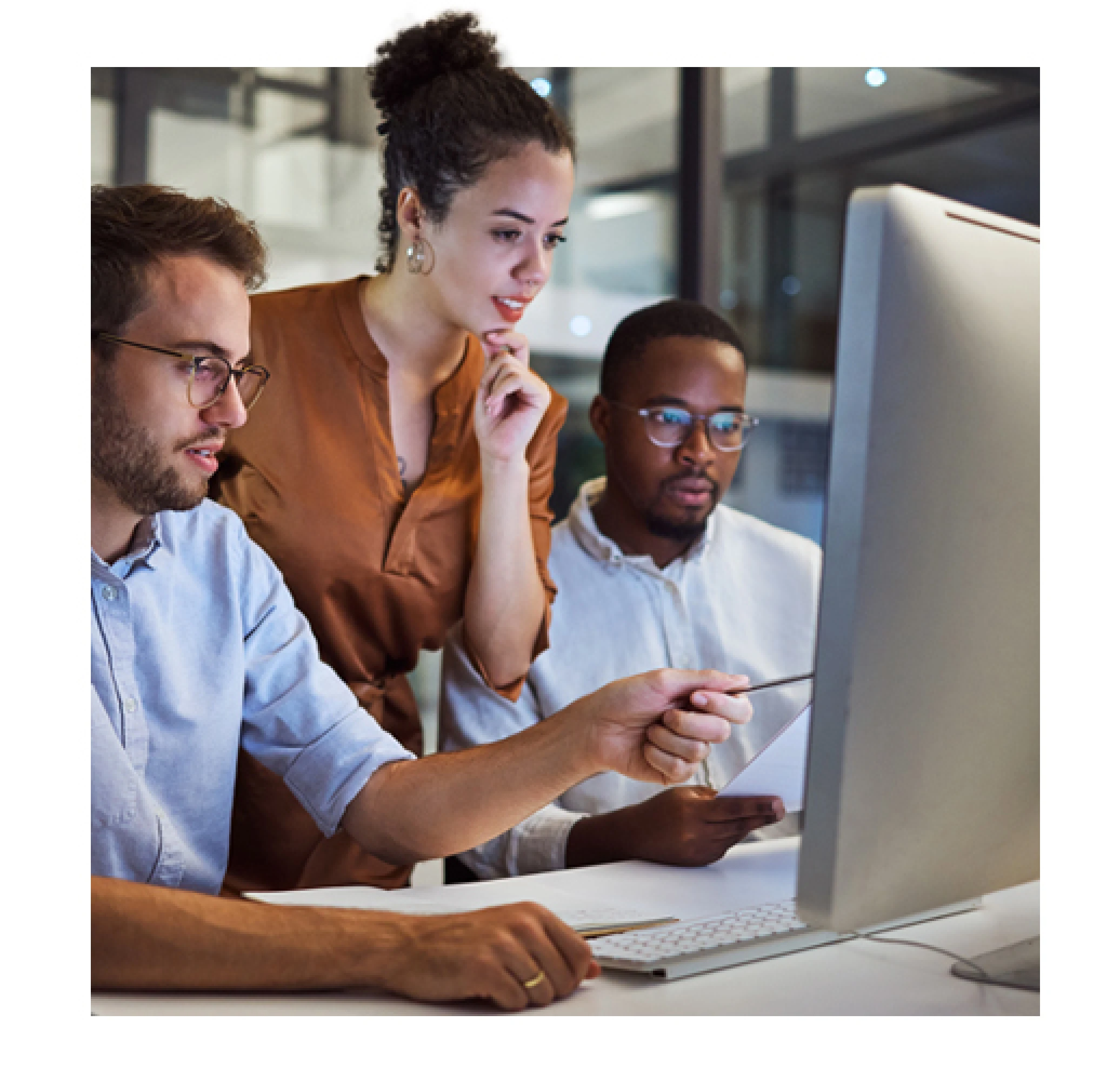 People looking at a computer