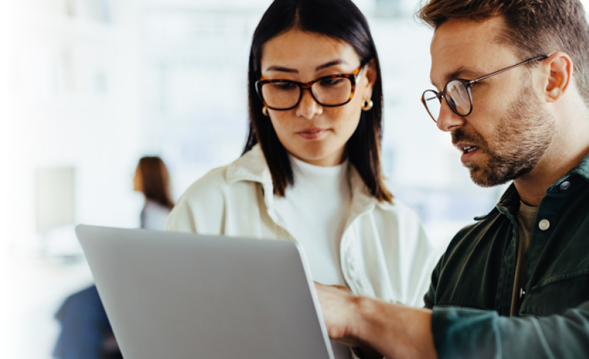 People using a laptop